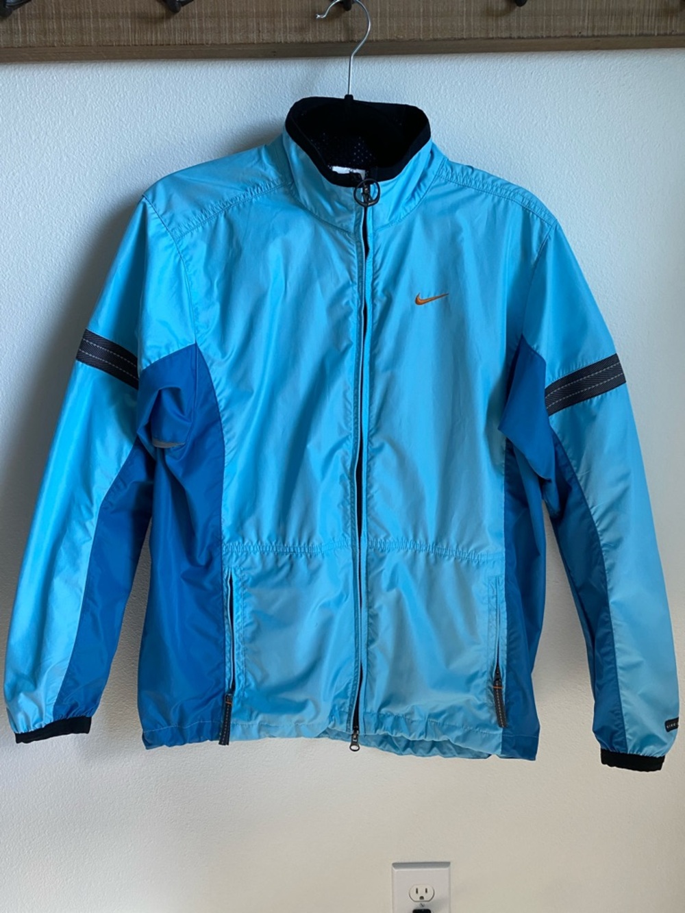 Nike Woman’s Blue Two-Tone Windbreaker Jacket with Orange Swoosh